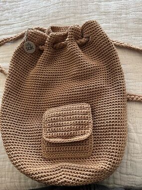 The Sak Crochet Drawstring Backpack in Beige